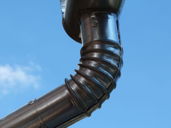 Metal Downspout Installation in Concord